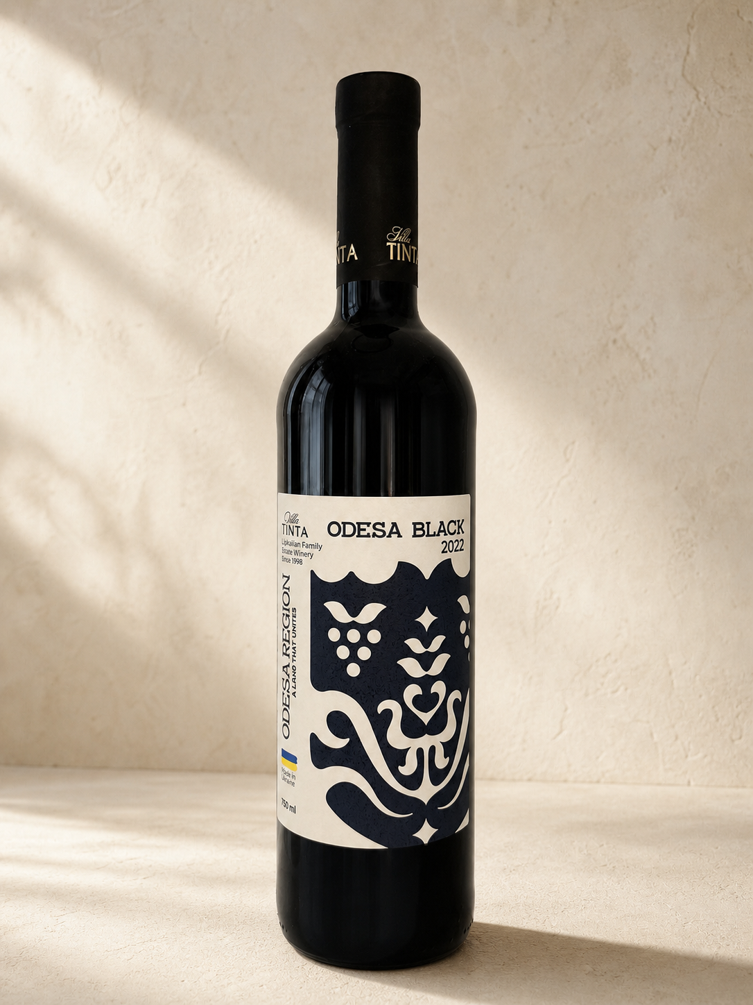 Villa Tinta Odesa Black 2022 bottle in warm studio light